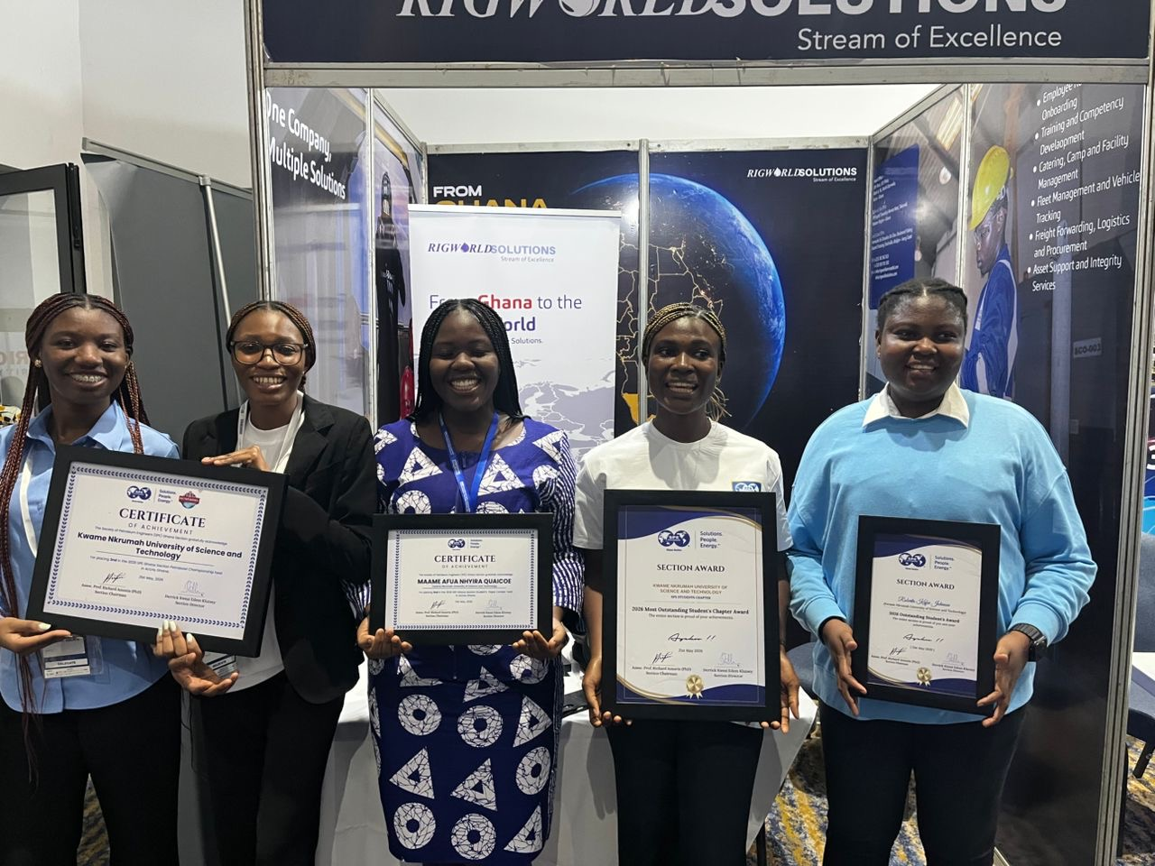 SPE Ghana award recipients holding certificates, including SPE KNUST's 2026 chapter award